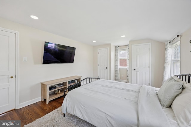 2120 Grand Ave, Morton, PA 19070 - bedroom featuring dark wood-style flooring, vaulted ceiling, baseboards, recessed lighting, and multiple closets