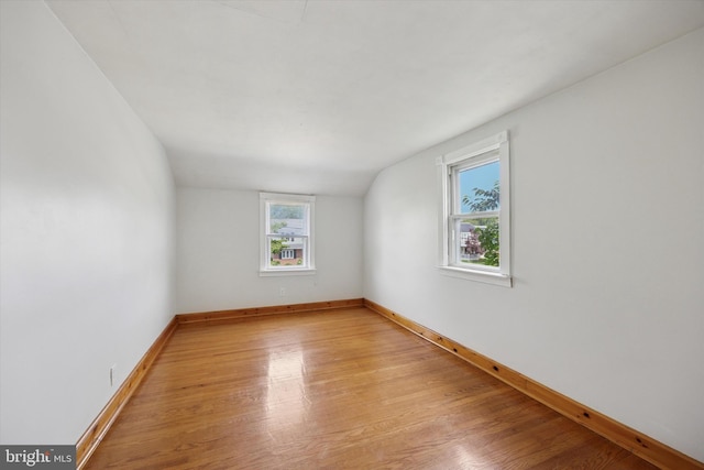 2120 Grand Ave, Morton, PA 19070 - unfurnished room with light wood-style floors, baseboards, and lofted ceiling