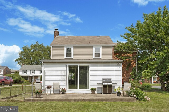 2120 Grand Ave, Morton, PA 19070 - rear view of house with a patio and a chimney