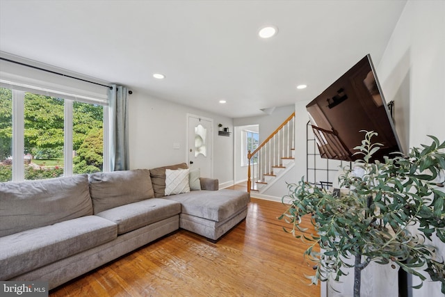 2120 Grand Ave, Morton, PA 19070 - living room with wood finished floors, plenty of natural light, recessed lighting, stairway, and baseboards