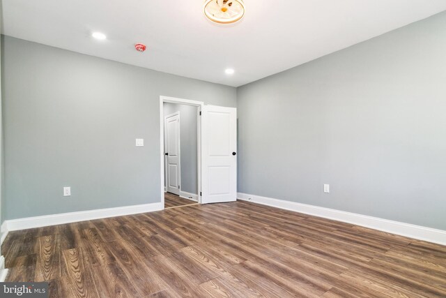 2525 W Lombard St, Baltimore, MD 21223 - spare room featuring wood finished floors, baseboards, and recessed lighting
