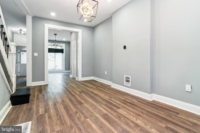 2525 W Lombard St, Baltimore, MD 21223 - unfurnished room featuring dark wood-type flooring, a chandelier, baseboards, and recessed lighting