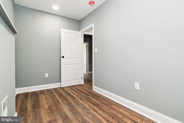 2525 W Lombard St, Baltimore, MD 21223 - unfurnished room with dark wood-type flooring, baseboards, and recessed lighting