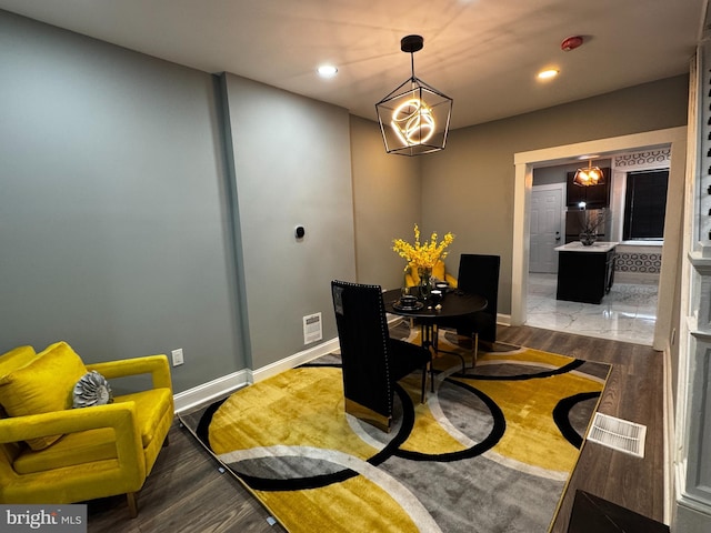 2525 W Lombard St, Baltimore, MD 21223 - dining area featuring wood finished floors, baseboards, and recessed lighting