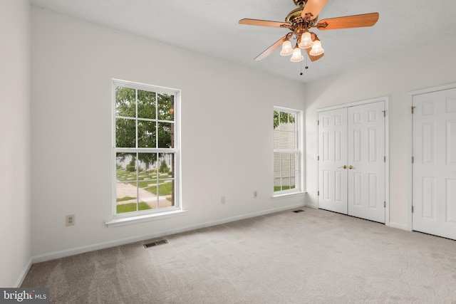 542 June Apple Ct, Abingdon, MD 21009 - unfurnished bedroom with carpet flooring, multiple windows, and baseboards