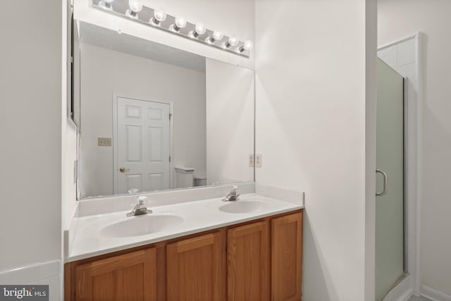 542 June Apple Ct, Abingdon, MD 21009 - bathroom featuring double vanity, an enclosed shower, and toilet