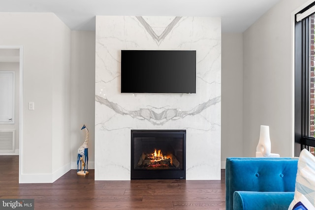 427 E Lancaster Ave Unit 1202, Wayne, PA 19087 - living area featuring wood finished floors and a fireplace