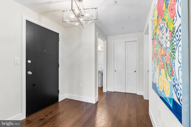 427 E Lancaster Ave Unit 1202, Wayne, PA 19087 - entryway featuring a chandelier and dark wood-style floors