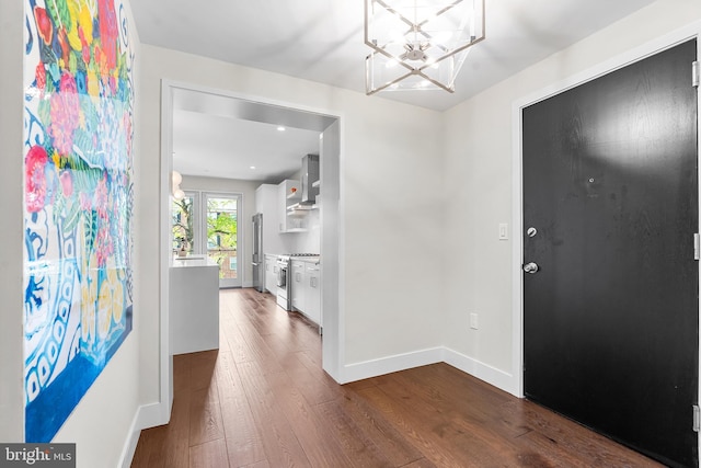 427 E Lancaster Ave Unit 1202, Wayne, PA 19087 - entrance foyer featuring a chandelier and dark wood-style floors