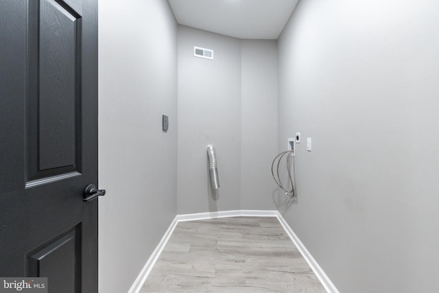 5229 Webster St, Philadelphia, PA 19143 - laundry room with light wood-style floors, washer hookup, and baseboards