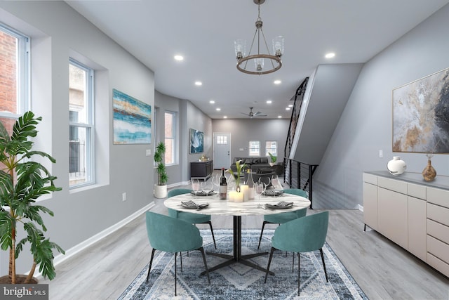 5229 Webster St, Philadelphia, PA 19143 - dining area with light wood-type flooring, a chandelier, recessed lighting, healthy amount of natural light, and baseboards