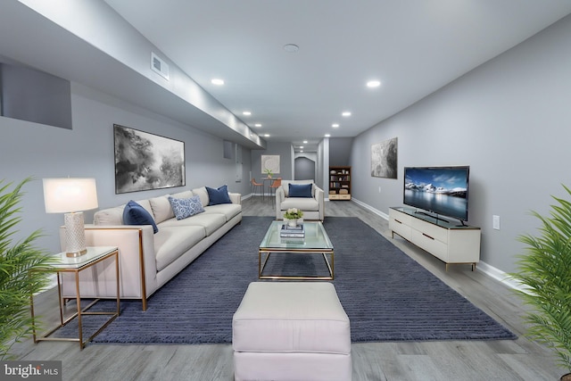 5229 Webster St, Philadelphia, PA 19143 - living room featuring wood finished floors, baseboards, and recessed lighting