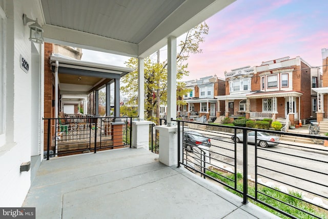 5229 Webster St, Philadelphia, PA 19143 - balcony at dusk featuring a residential view