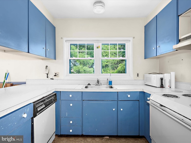 435 Yellow Spgs S, Laurel, MD 20724 - kitchen with white appliances, blue cabinets, a sink, and light countertops