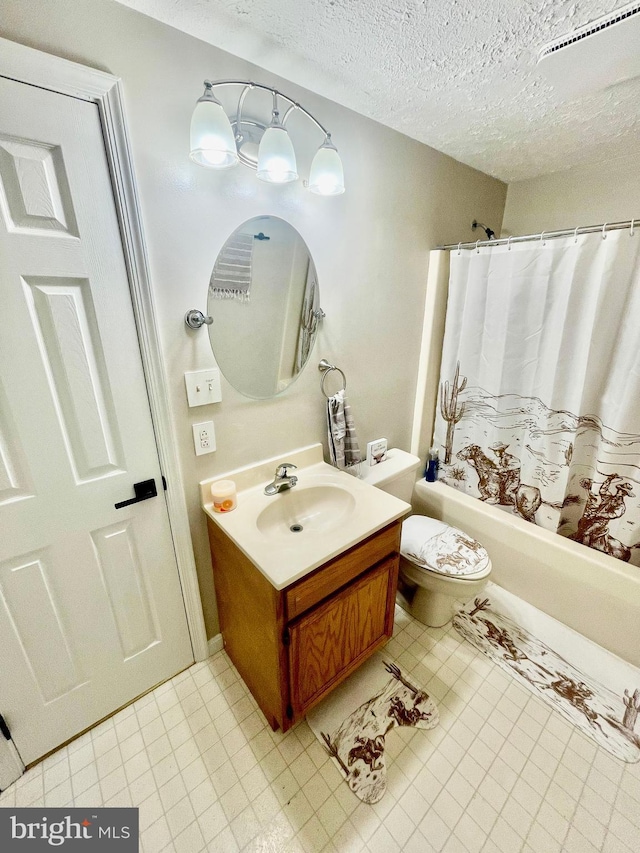 25795 Shamrock Ln, Mechanicsville, MD 20659 - full bath featuring vanity, toilet, shower / bathtub combination with curtain, and a textured ceiling