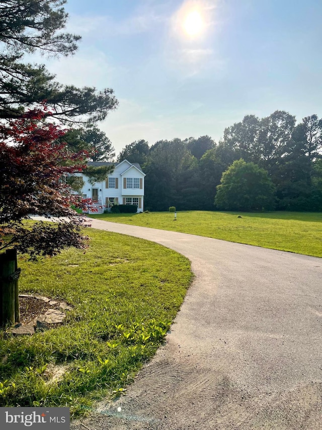25795 Shamrock Ln, Mechanicsville, MD 20659 - view of front of property with a front yard and asphalt driveway