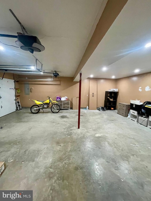 25795 Shamrock Ln, Mechanicsville, MD 20659 - garage featuring electric panel and a garage door opener