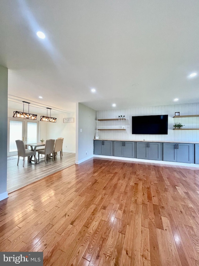 25795 Shamrock Ln, Mechanicsville, MD 20659 - unfurnished living room with light wood-style floors, recessed lighting, and baseboards