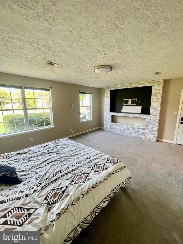 25795 Shamrock Ln, Mechanicsville, MD 20659 - bedroom featuring carpet floors, baseboards, and a textured ceiling