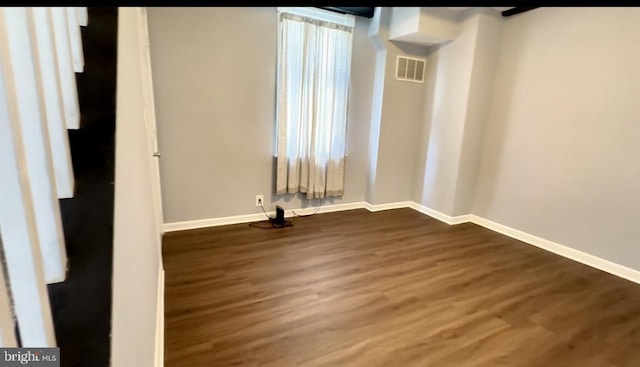 1707 Harman Ave, Baltimore, MD 21230 - empty room with dark wood-type flooring and baseboards