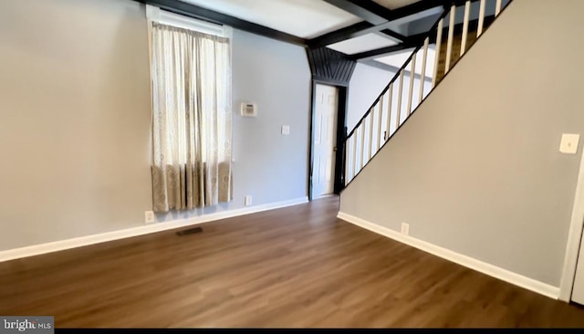 1707 Harman Ave, Baltimore, MD 21230 - unfurnished living room with dark wood-style floors, baseboards, stairs, and beam ceiling