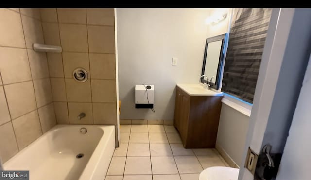 1707 Harman Ave, Baltimore, MD 21230 - full bath with vanity, tile patterned flooring, toilet, and bathing tub / shower combination
