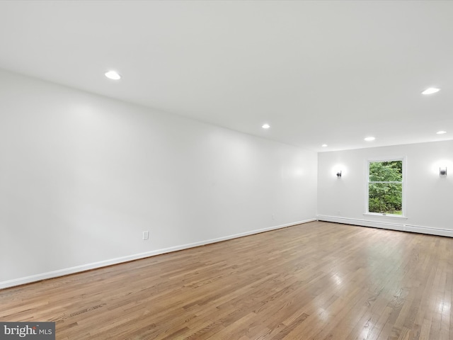 2500 Sams Creek Rd, Westminster, MD 21157 - spare room with light wood-style floors, recessed lighting, and a baseboard radiator