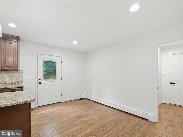 2500 Sams Creek Rd, Westminster, MD 21157 - unfurnished dining area featuring a baseboard heating unit, light wood-type flooring, and recessed lighting
