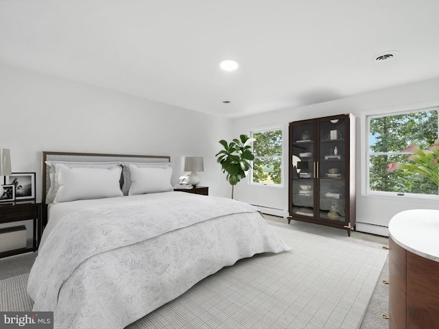 2500 Sams Creek Rd, Westminster, MD 21157 - bedroom featuring multiple windows, baseboard heating, carpet, and recessed lighting