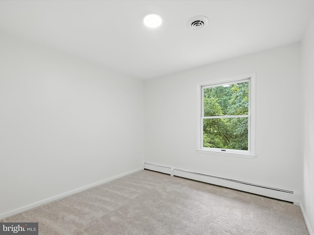 2500 Sams Creek Rd, Westminster, MD 21157 - carpeted empty room with a baseboard heating unit and baseboards
