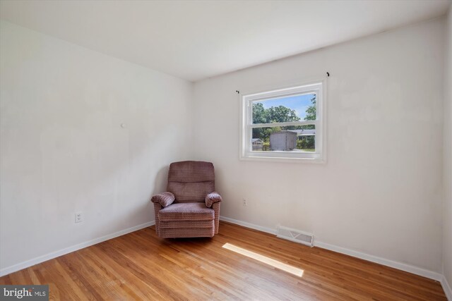 10520 Truxton Rd, Hyattsville, MD 20783 - unfurnished room with baseboards and light wood-style floors