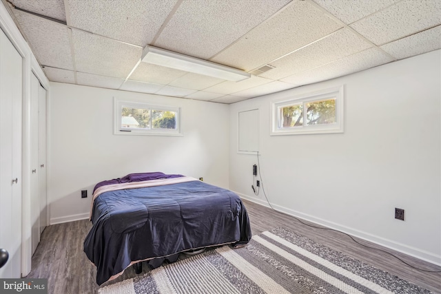 10520 Truxton Rd, Hyattsville, MD 20783 - bedroom with a drop ceiling, wood finished floors, and baseboards