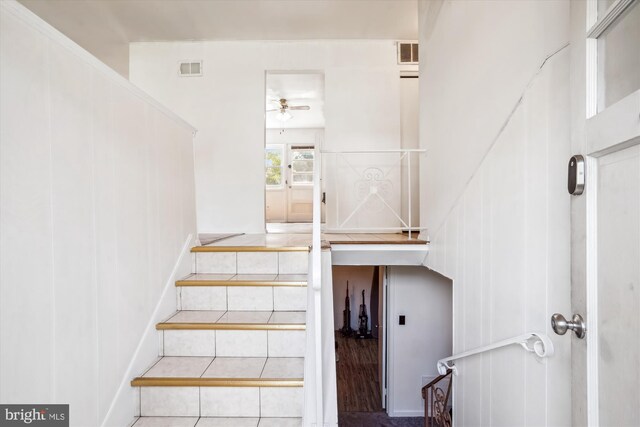 10520 Truxton Rd, Hyattsville, MD 20783 - stairs with a ceiling fan and tile patterned floors