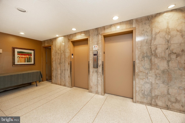 309 Florence Ave Unit 420-N, Jenkintown, PA 19046 - hallway featuring elevator, recessed lighting, and speckled floor