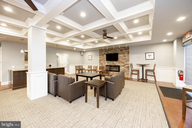309 Florence Ave Unit 420-N, Jenkintown, PA 19046 - living room featuring ornate columns, ceiling fan, coffered ceiling, beamed ceiling, and a decorative wall