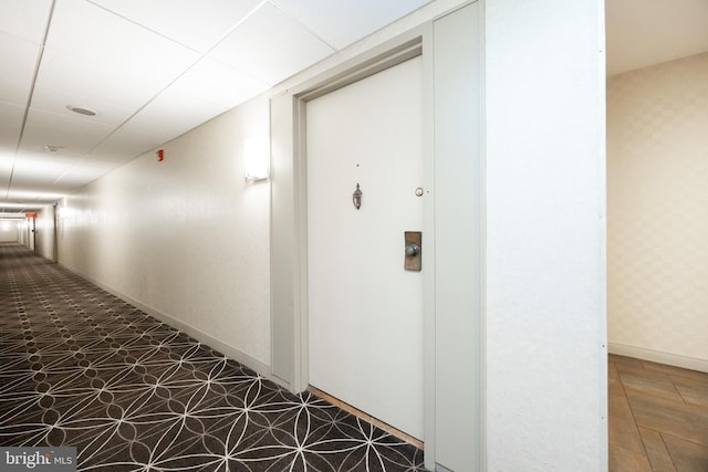 309 Florence Ave Unit 420-N, Jenkintown, PA 19046 - corridor with baseboards and a drop ceiling
