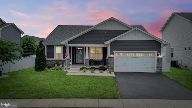 2017 Chamberlain Dr, Frederick, MD 21702 - craftsman-style home featuring board and batten siding, driveway, a garage, and stone siding