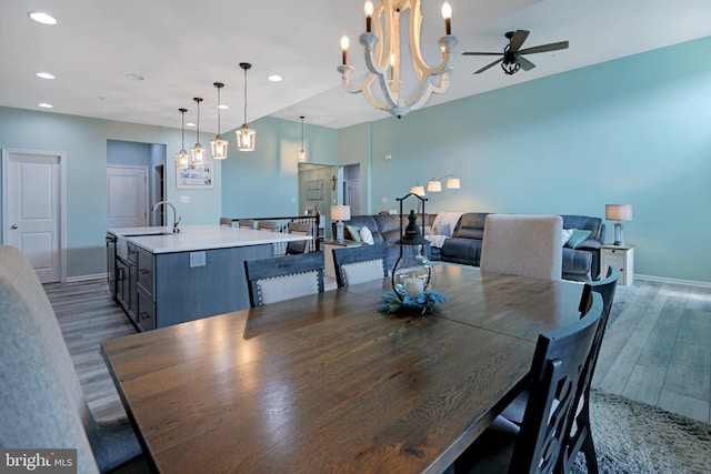 2017 Chamberlain Dr, Frederick, MD 21702 - dining space with a ceiling fan, dark wood-style flooring, baseboards, a chandelier, and recessed lighting