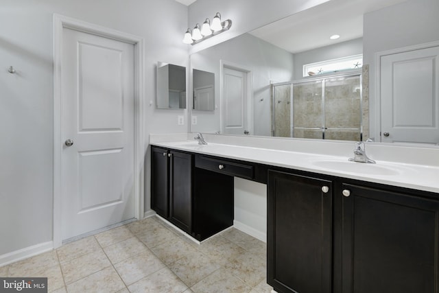 2017 Chamberlain Dr, Frederick, MD 21702 - full bathroom with double vanity, a stall shower, tile patterned floors, and baseboards