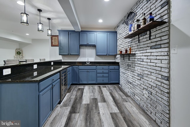 2017 Chamberlain Dr, Frederick, MD 21702 - kitchen featuring open shelves, blue cabinetry, wood finished floors, wine cooler, and recessed lighting
