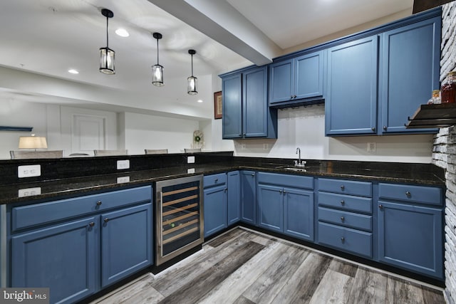 2017 Chamberlain Dr, Frederick, MD 21702 - kitchen with beverage cooler, blue cabinets, a sink, and recessed lighting