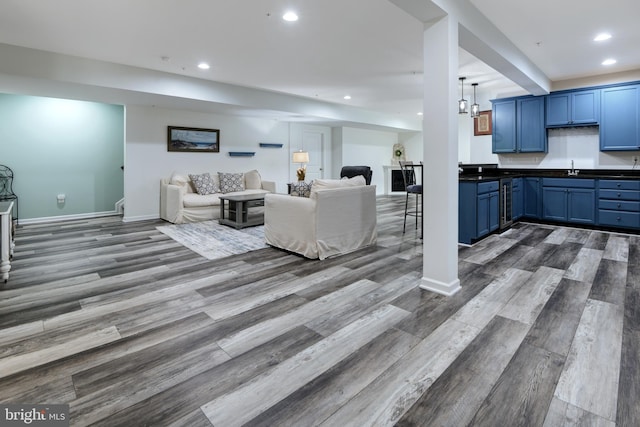 2017 Chamberlain Dr, Frederick, MD 21702 - living room featuring dark wood-style floors, recessed lighting, and baseboards