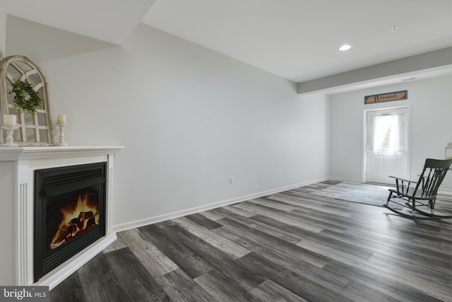 2017 Chamberlain Dr, Frederick, MD 21702 - unfurnished living room featuring wood finished floors, recessed lighting, a lit fireplace, and baseboards