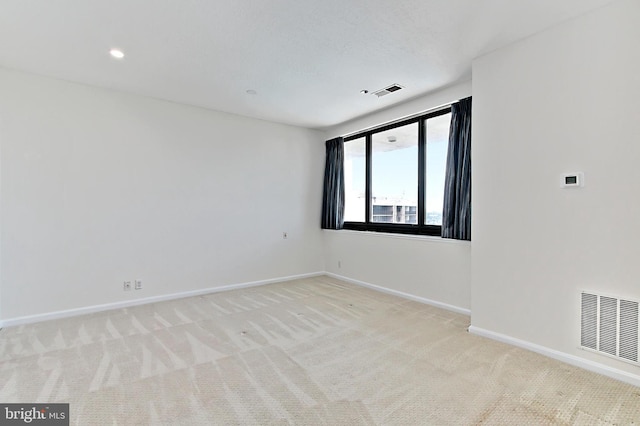 1805 Crystal Dr Unit 1110S, Arlington, VA 22202 - carpeted spare room with baseboards and recessed lighting