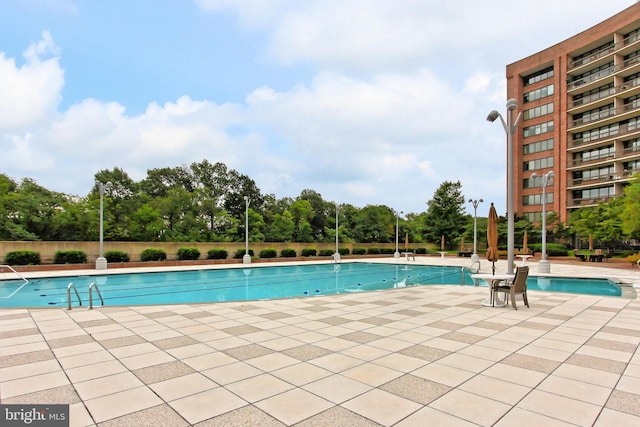 1805 Crystal Dr Unit 1110S, Arlington, VA 22202 - community pool featuring a patio
