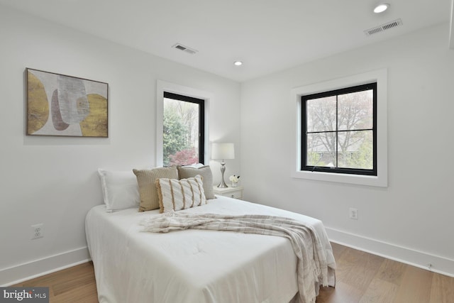 4324 Yuma St NW, Washington, DC 20016 - bedroom featuring baseboards, wood finished floors, and recessed lighting