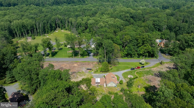 402 Swamp Rd, Morgantown, PA 19543 - aerial overview of property's location with a heavily wooded area