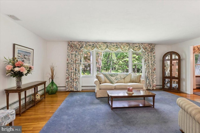 161 Bull Run Rd, Pennington, NJ 08534 - living room with wood finished floors, a baseboard radiator, and baseboard heating