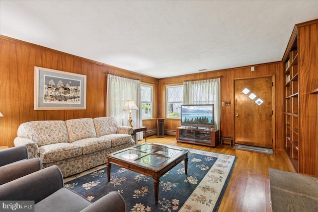 161 Bull Run Rd, Pennington, NJ 08534 - living room with wooden walls, a baseboard radiator, and wood finished floors