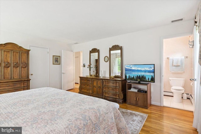 161 Bull Run Rd, Pennington, NJ 08534 - bedroom featuring a baseboard heating unit, wood finished floors, and connected bathroom